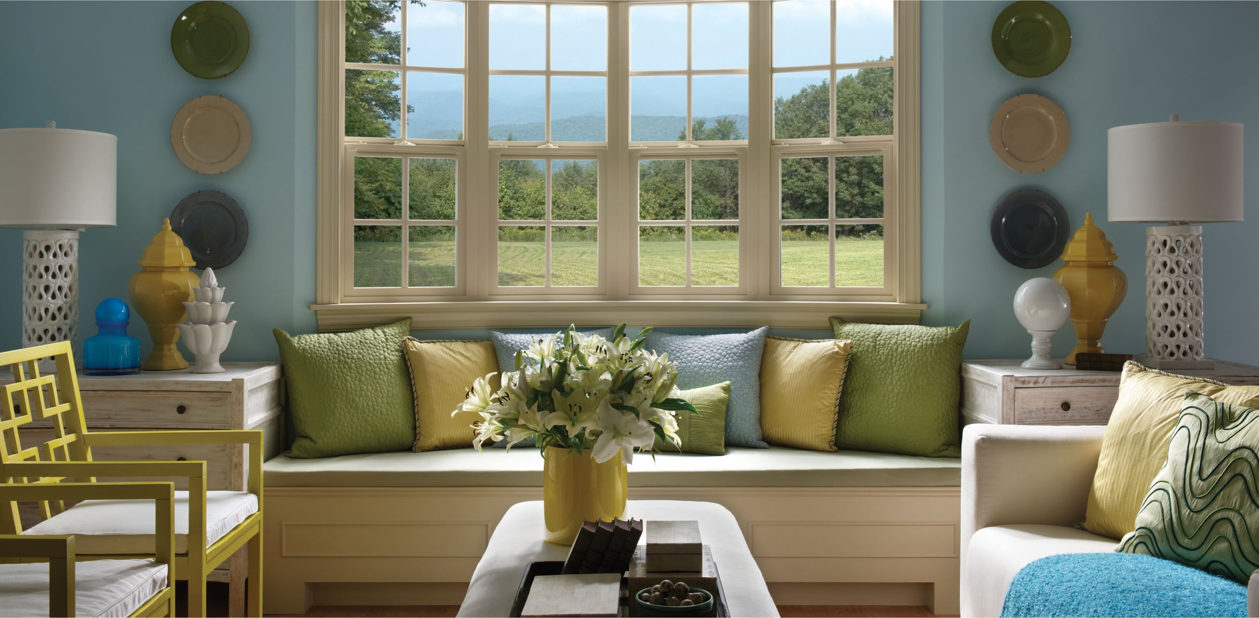 PGW_Interior_LivingRoom_WestProSeries_BayBowWindow_IdeasInspiration_Module_2_1243x610_p218 Four-Lite Bow Window with Single Hungs and Colonial Grilles