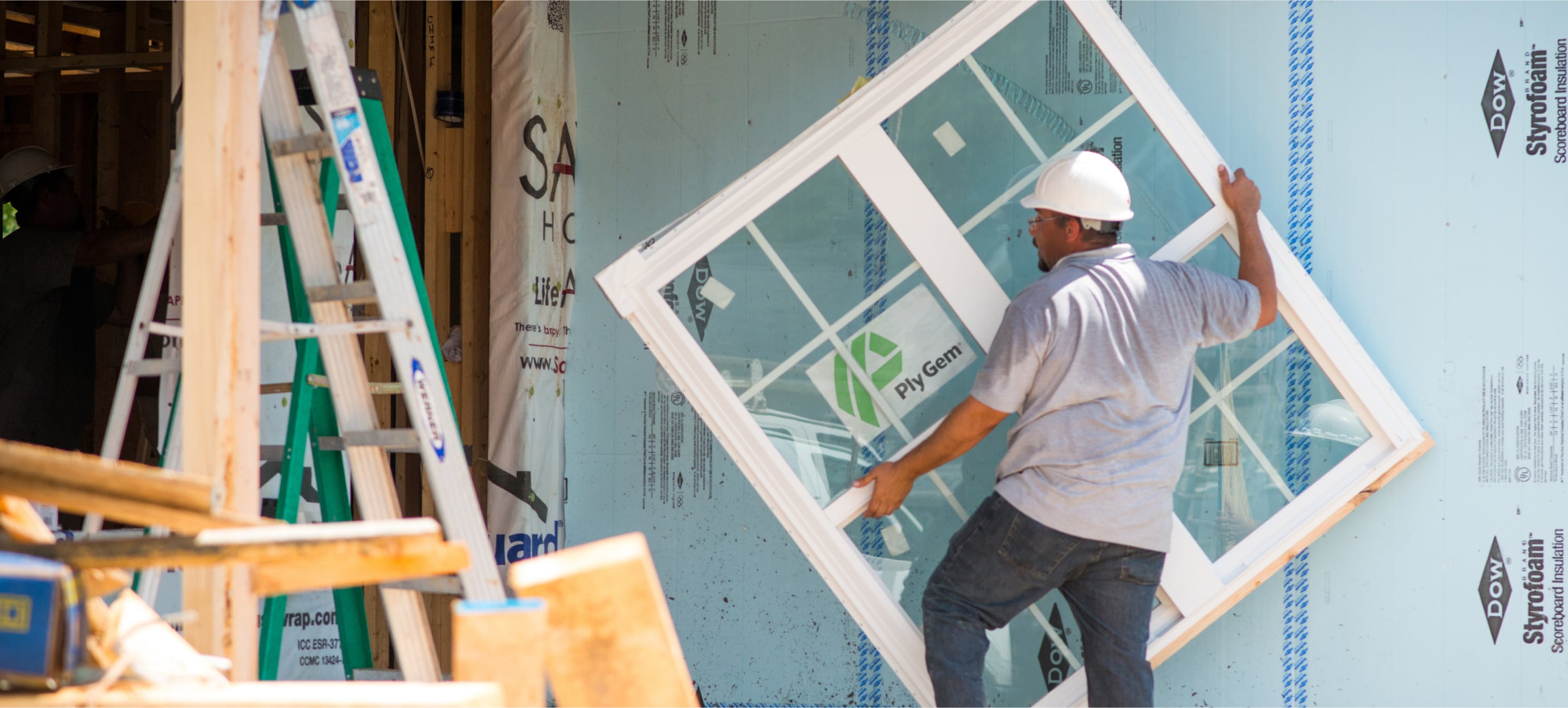 Person Installing a Ply Gem Window - Resources for Window Professionals